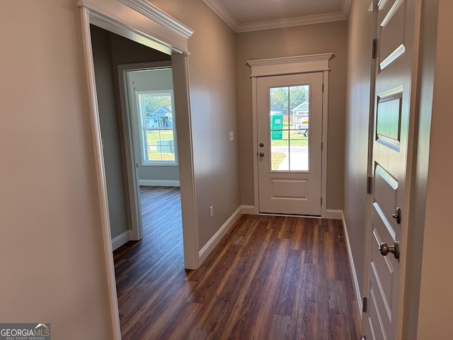 entryway with dark hardwood / wood-style flooring and ornamental molding