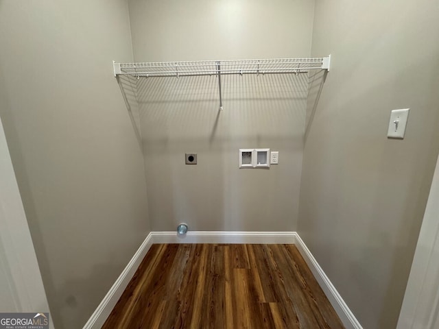 clothes washing area featuring hookup for an electric dryer, hardwood / wood-style floors, and washer hookup