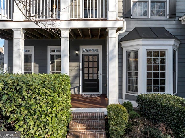 doorway to property featuring a balcony