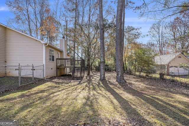 view of yard with a deck