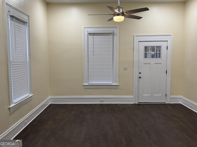 entrance foyer featuring ceiling fan and dark hardwood / wood-style flooring