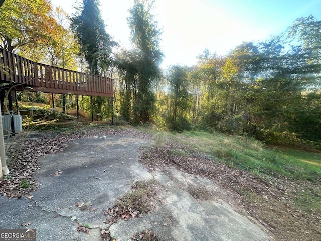 view of yard with a wooden deck