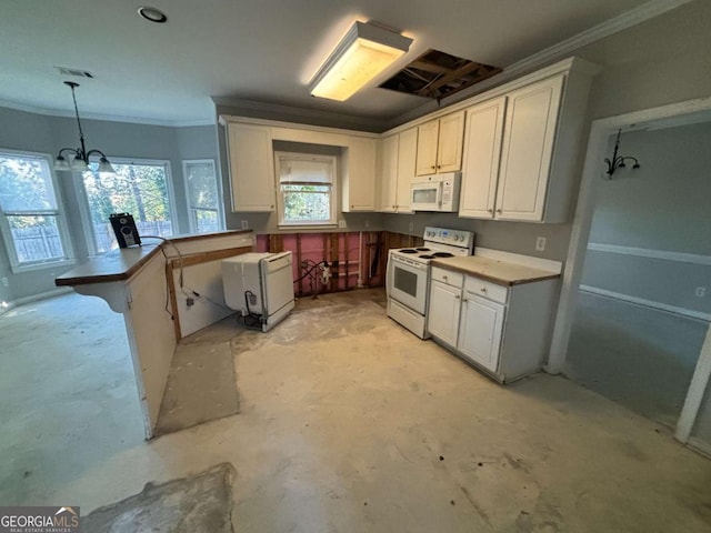 kitchen featuring kitchen peninsula, white appliances, pendant lighting, an inviting chandelier, and white cabinets