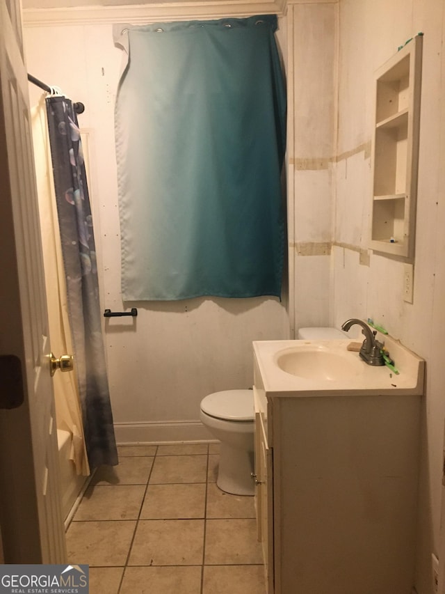 full bathroom featuring tile patterned flooring, vanity, toilet, and shower / bath combo