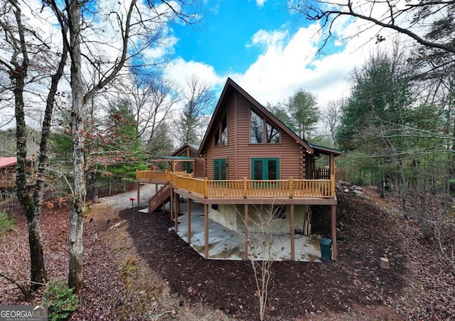 236 William Branch Rd, Morganton, GA 30560 - back of property featuring stairway, a patio, log siding, and a wooden deck