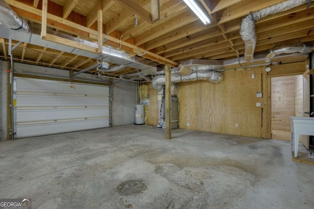 garage with heating unit and water heater