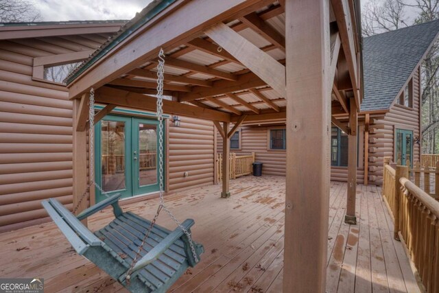 wooden deck with french doors