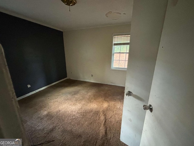 unfurnished room with carpet floors