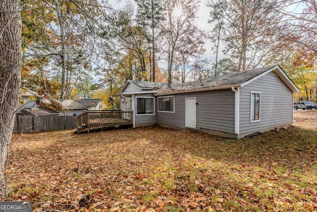 rear view of property with a deck