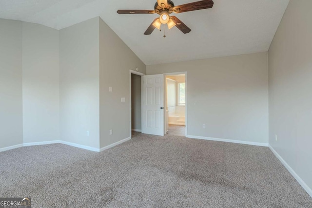 unfurnished room featuring light carpet, ceiling fan, and lofted ceiling