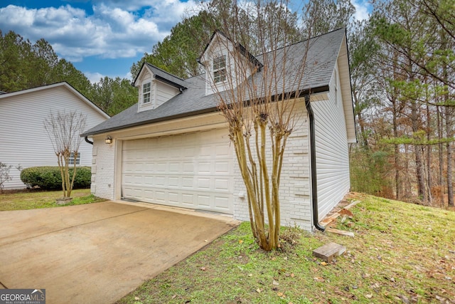 garage with a lawn