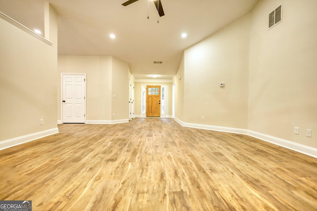 interior space with ceiling fan and light wood-type flooring