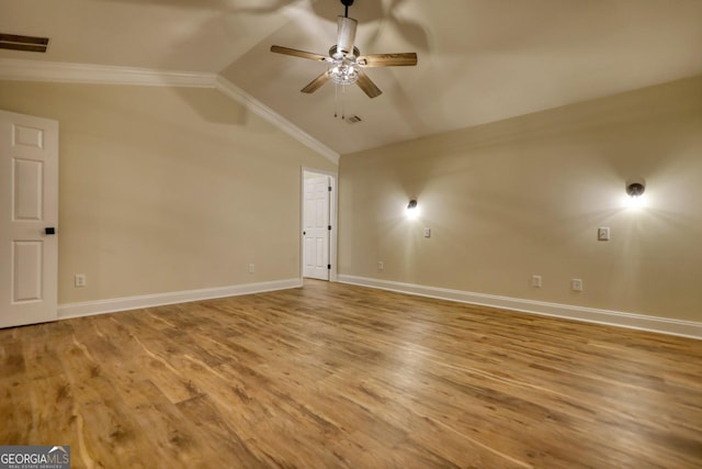 unfurnished room featuring hardwood / wood-style floors, ceiling fan, and lofted ceiling