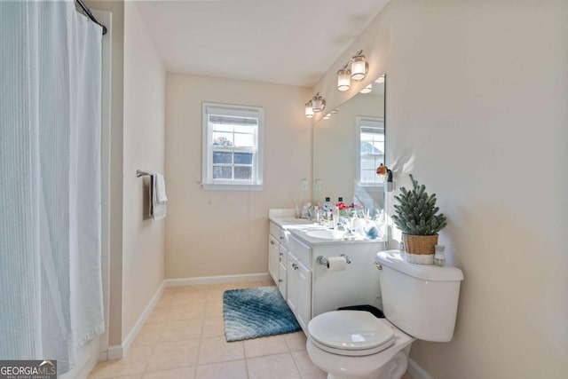 bathroom featuring tile patterned floors, vanity, toilet, and a shower with shower curtain