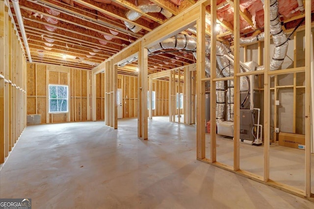misc room with concrete flooring