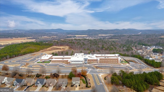 drone / aerial view featuring a mountain view