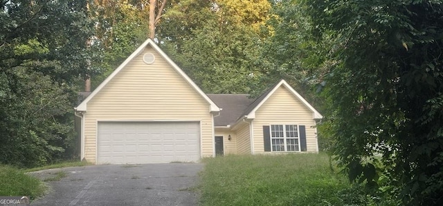 ranch-style home with a garage