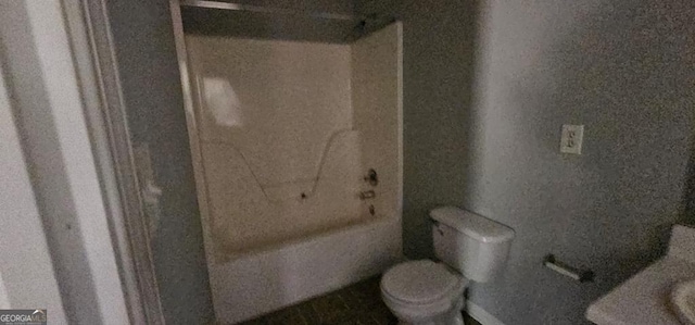 bathroom featuring toilet