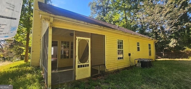 view of property exterior with central AC unit