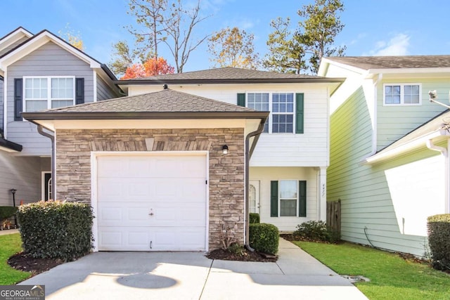 view of front of property featuring a garage