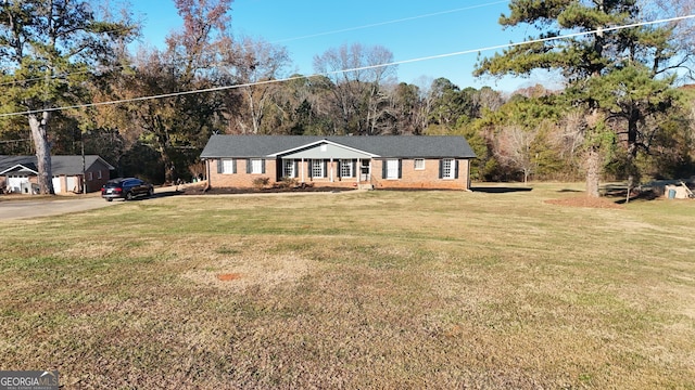 ranch-style house with a front yard