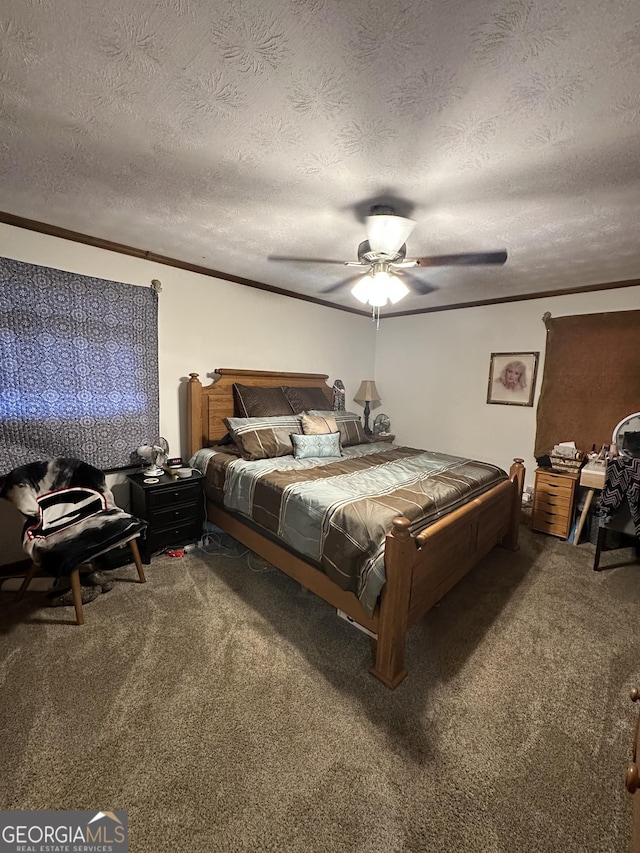 bedroom with carpet, a textured ceiling, and ceiling fan