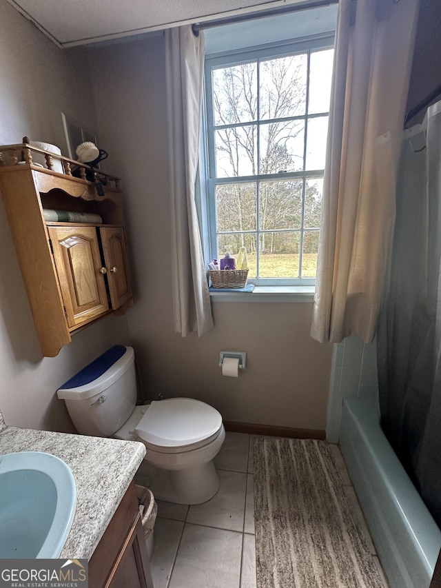 full bathroom with tile patterned flooring, vanity, toilet, and shower / bathtub combination with curtain