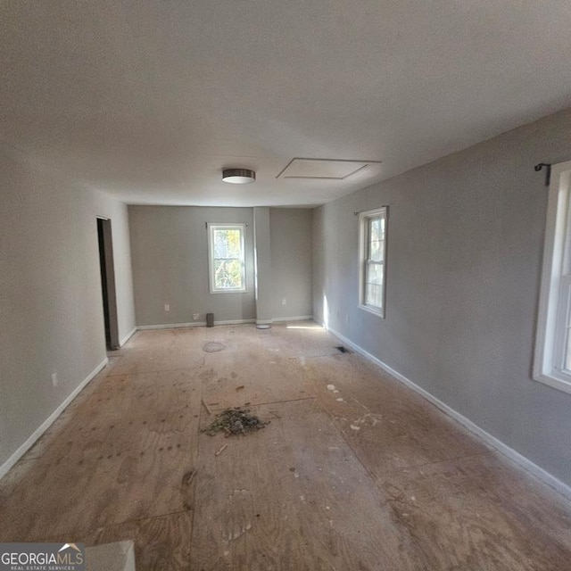 spare room with a textured ceiling