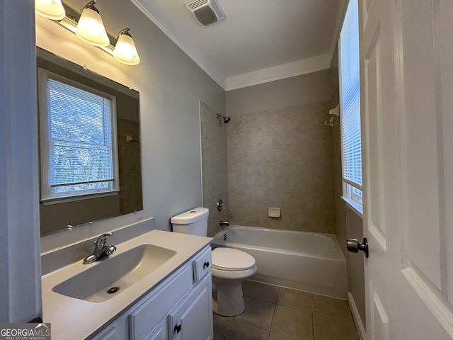 full bathroom featuring vanity, tile patterned flooring, tiled shower / bath combo, toilet, and ornamental molding