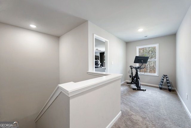 workout room featuring carpet