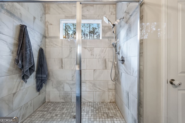 bathroom with an enclosed shower