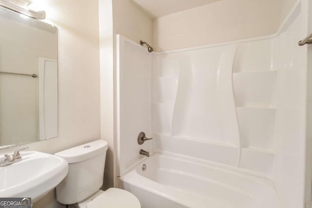 full bathroom featuring shower / bathtub combination, toilet, and sink