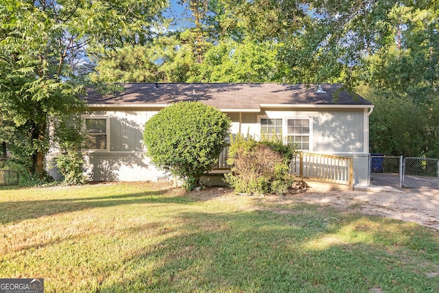 view of front of home with a front yard