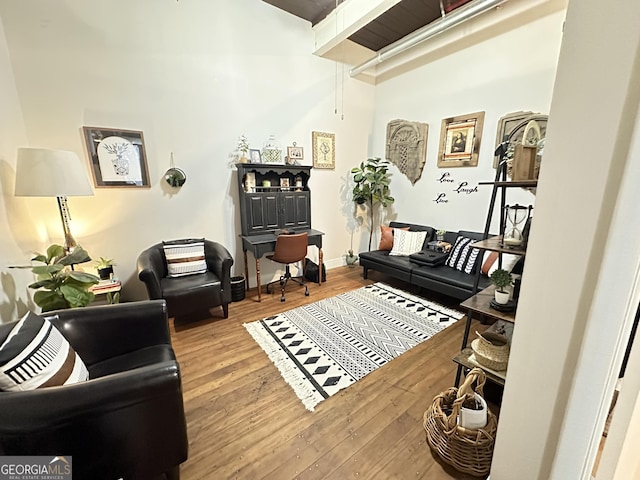 living area with wood-type flooring