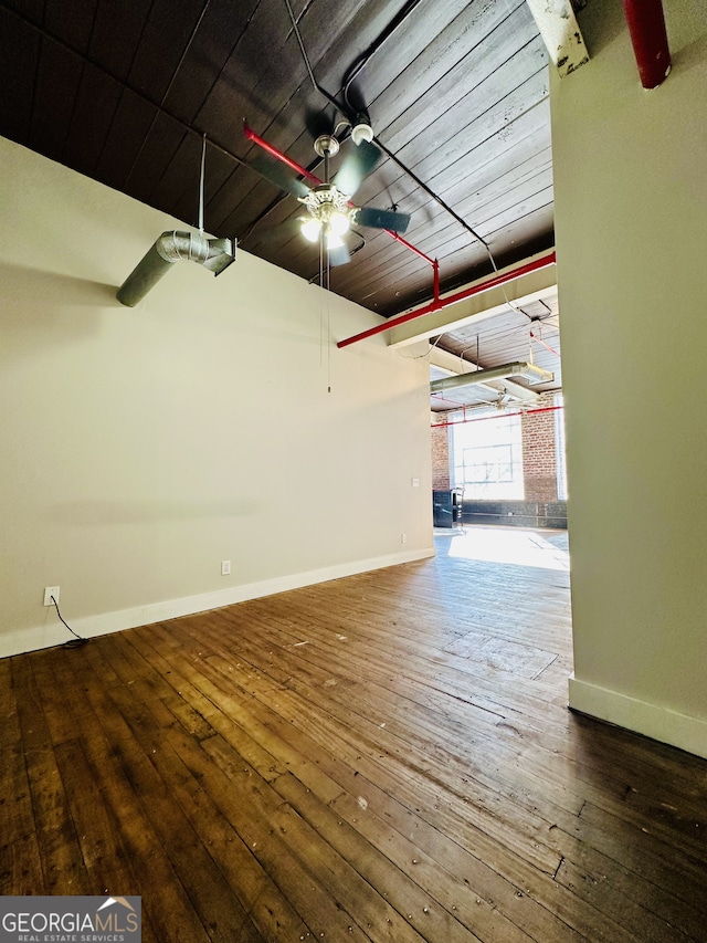 garage with ceiling fan and wood ceiling