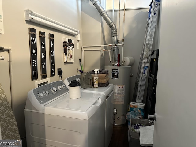 laundry room featuring washer and dryer and water heater