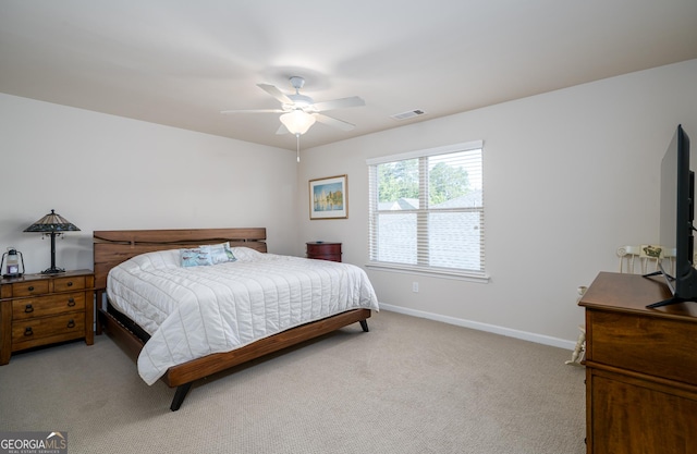 carpeted bedroom with ceiling fan