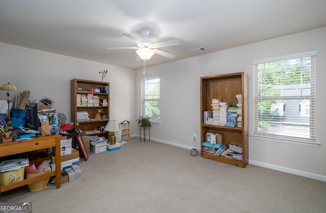 misc room featuring ceiling fan, plenty of natural light, and carpet floors