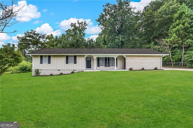 view of front of home featuring a front yard and a porch