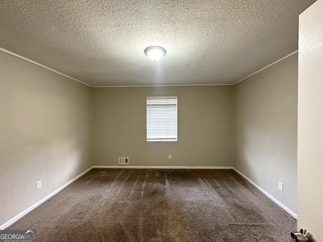 carpeted spare room with a textured ceiling and ornamental molding