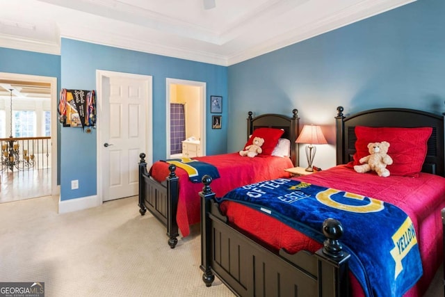 carpeted bedroom with ceiling fan, ornamental molding, and connected bathroom