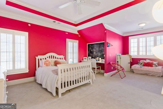 carpeted bedroom featuring ceiling fan and ornamental molding