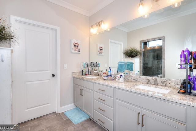 bathroom with tile patterned flooring, an enclosed shower, crown molding, and vanity