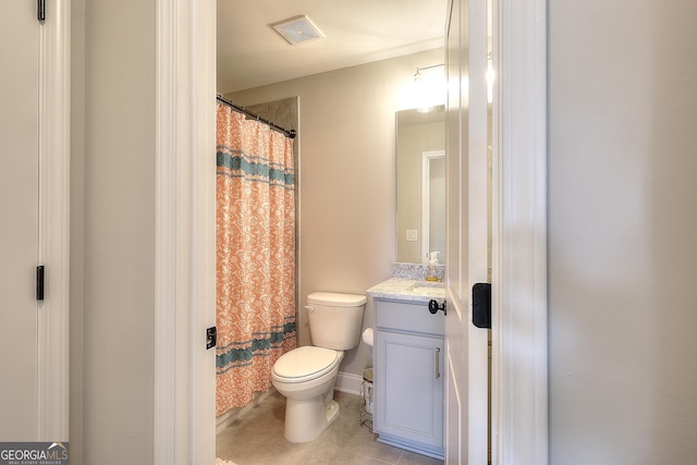 bathroom featuring toilet, tile patterned flooring, curtained shower, and vanity