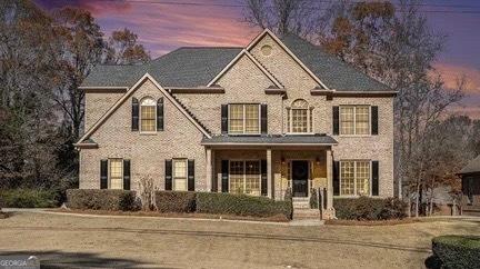 view of front of home with a yard