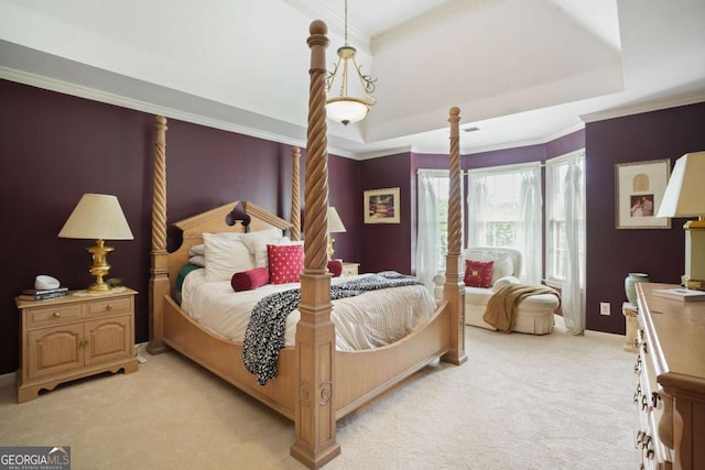 bedroom with light carpet, a raised ceiling, and ornamental molding