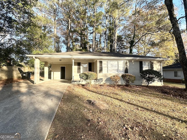 single story home with a carport