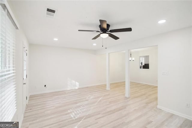 interior space with ceiling fan and light hardwood / wood-style flooring