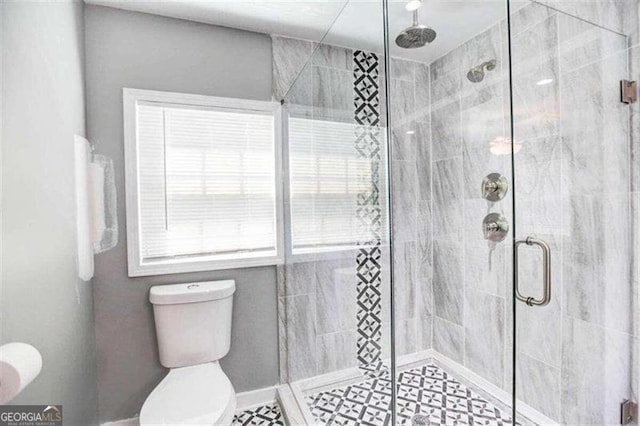 406 Illinois Ave NW, Atlanta, GA 30314 - bathroom with toilet, plenty of natural light, and walk in shower