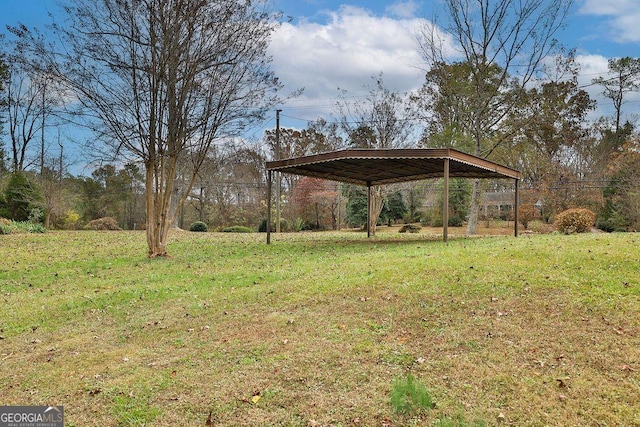 view of yard with a carport